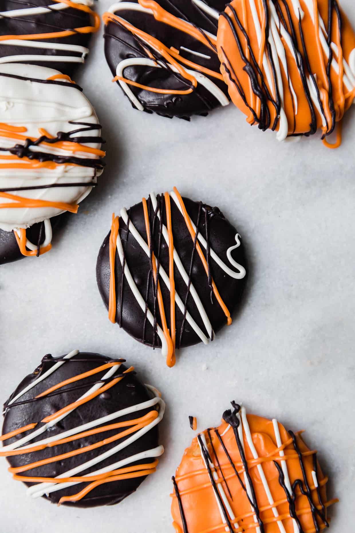 Halloween Crackers on a white marble background.