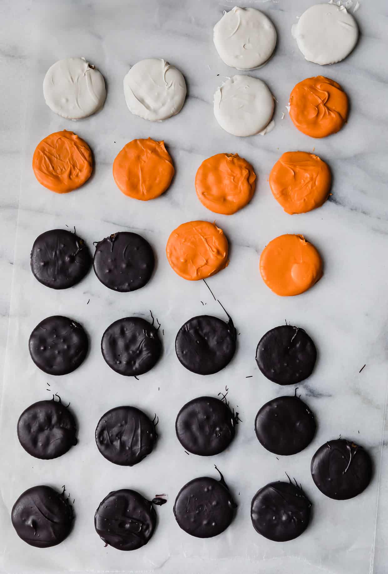 Orange, white, and black covered Halloween Crackers.