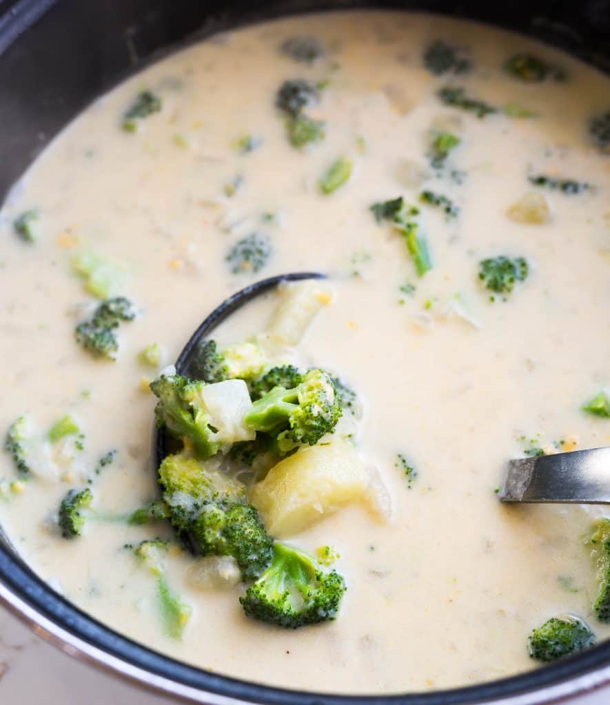 A large pot full of broccoli potato soup. 