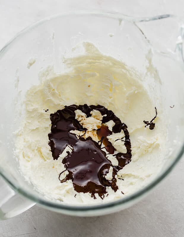 A glass bowl with French silk pie ingredients in it.