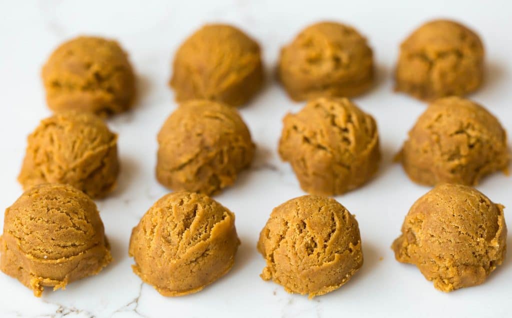 Small balls of gingersnap cookie dough.