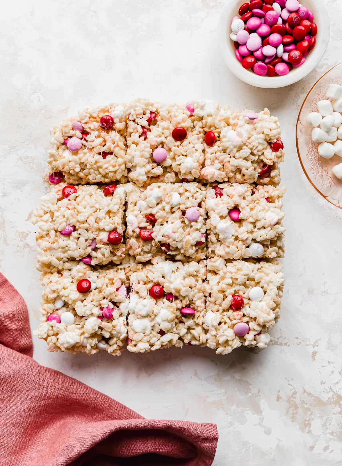 Valentine Rice Krispie Treats cut into 9 squares on a white background.