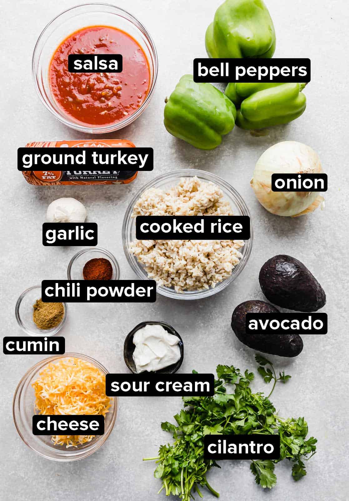 Ingredients used to make Deconstructed Stuffed Peppers on a gray background.