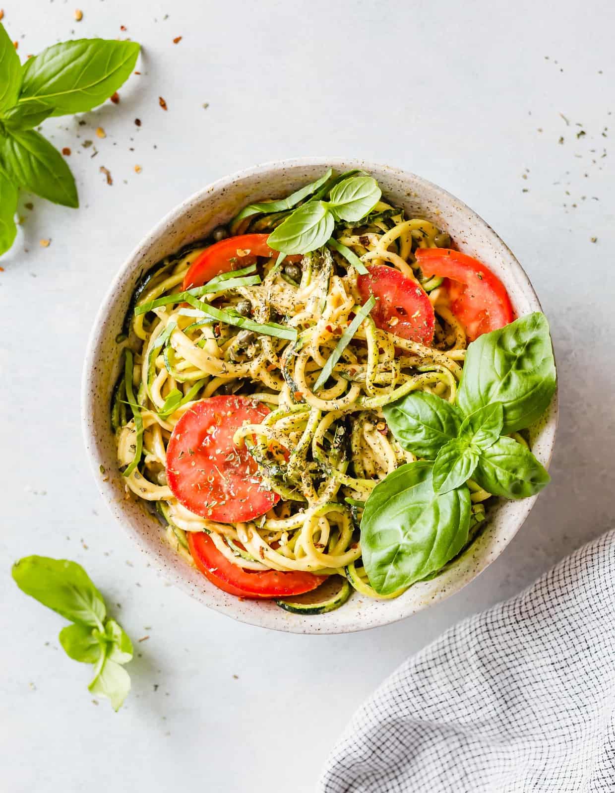 5-Minute Cheesy Zucchetti Bowl is the perfect zucchini noodles recipe! It's a fun and delicious way to eat your veggies! This delicious gluten free bowl is low carb too!