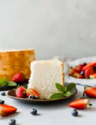 An easy to make Angel Food Cake Recipe that's soft, fluffy, and rich in flavor! Add fruit and whipped cream and you've just made the perfect dessert!