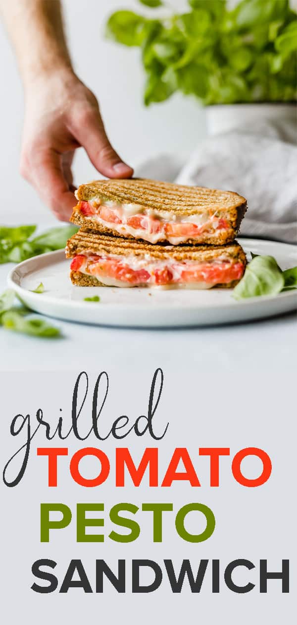 This Grilled Tomato, Mozzarella, and Pesto Sandwich is bursting with flavor! The pesto, mayo, and tomato make for an extra moist and juicy sandwich! Full is at saltandbaker.com #saltandbaker #sandwiches #lunchideas #sandwichrecipes #easyrecipes #kidfriendly #tomato #pesto