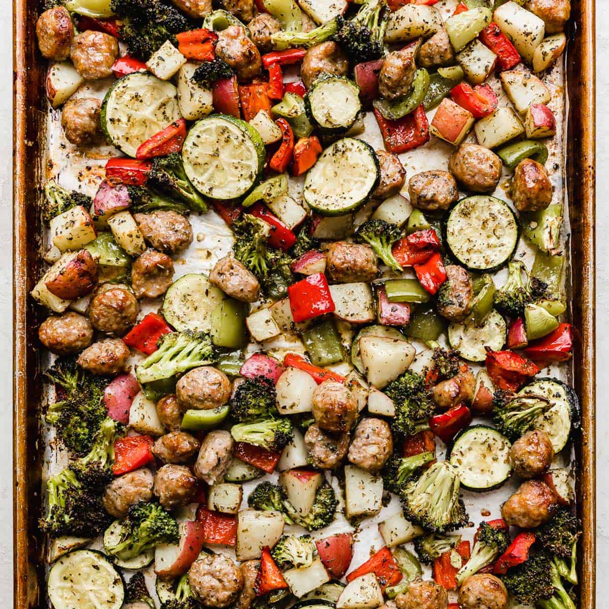 https://saltandbaker.com/wp-content/uploads/2018/05/Sheet-pan-italian-sausage-vegetable-bake-square.jpg