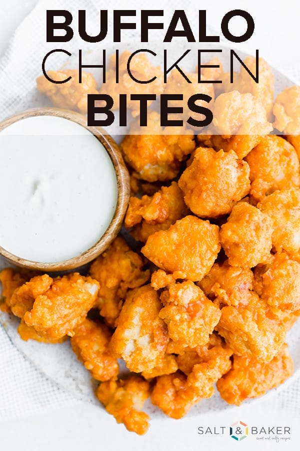 Perfectly crispy on the outside, and moist and tender on the inside, these Buffalo Chicken Bites are the perfect appetizer to serve on game day or at a party! #saltandbaker #buffalochicken #partyfood #gamedayfood #appetizer #fingerfood #superbowlfood #appetizerrecipes