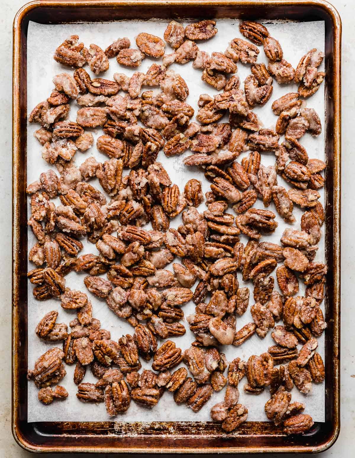 Roasted Candied Pecans on a baking sheet.