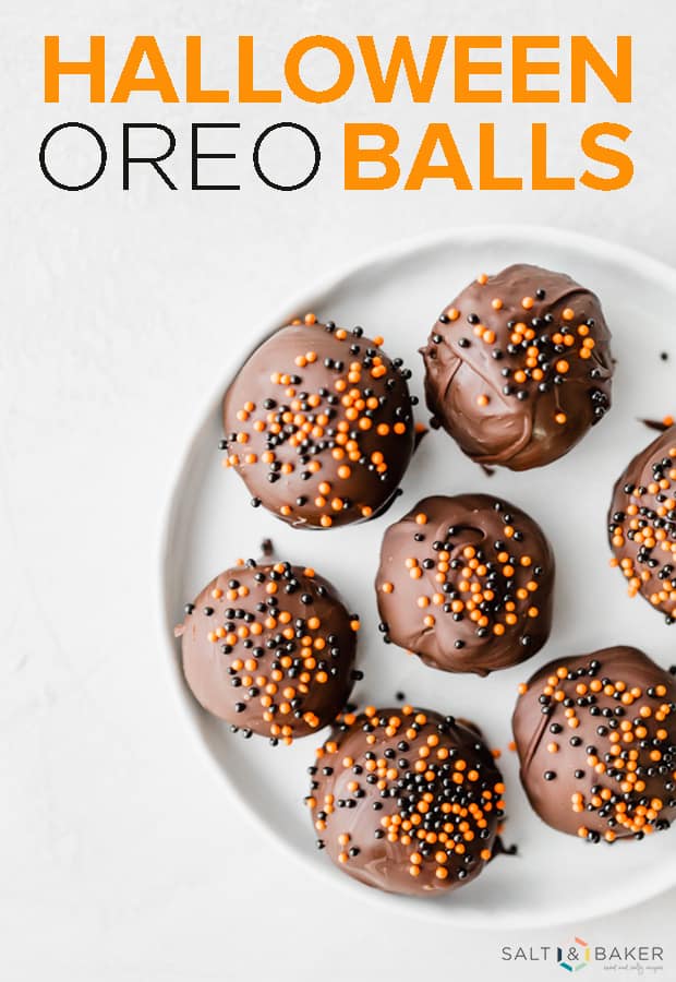 Halloween Oreo Balls dipped in chocolate and garnished with sprinkles, kids and adults won't be able to resist this festive treat! #saltandbaker #halloweenfood #oreoballs #oreorecipes