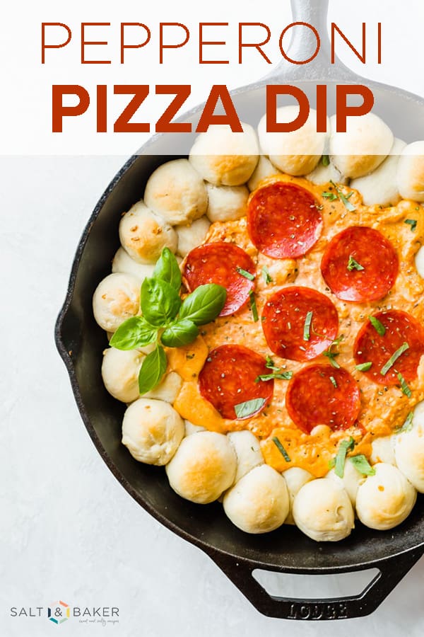 This Pepperoni Pizza Dip is cheesy, creamy, and bursting with all the pizza flavors! It's an easy appetizer recipe loved by all! #saltandbaker #pizza #pizzadip #gamedayfood