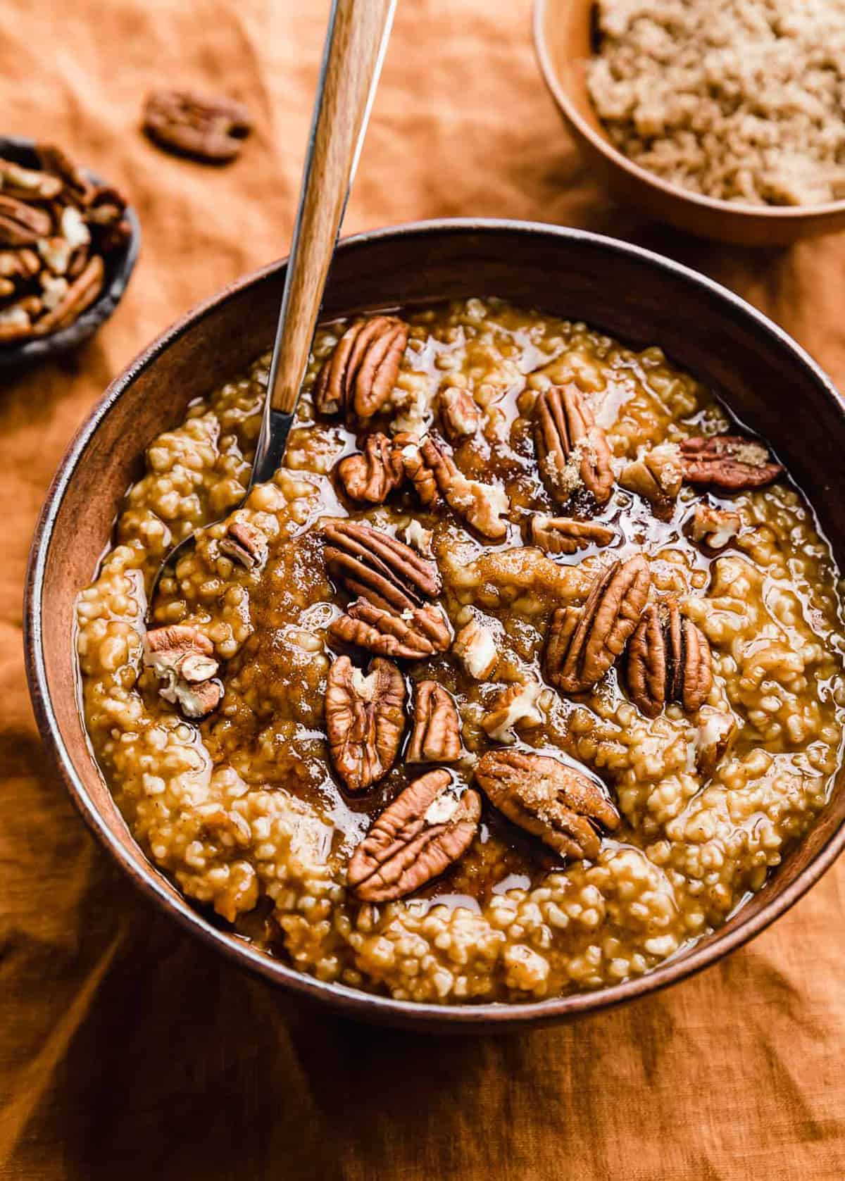 Pumpkin Steel Cut Oats on an orange background.