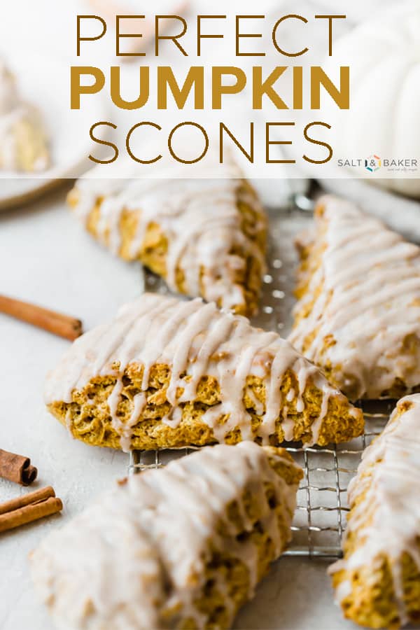 These Pumpkin Scones have a warm array of spices AND they're topped with two irresistible glazes. This is a perfect copycat version of Starbucks' pumpkin scones. #saltandbaker #pumpkin #pumpkinscones #Starbucks