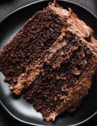 Two layer chocolate cake recipe frosted with a cream cheese chocolate frosting.