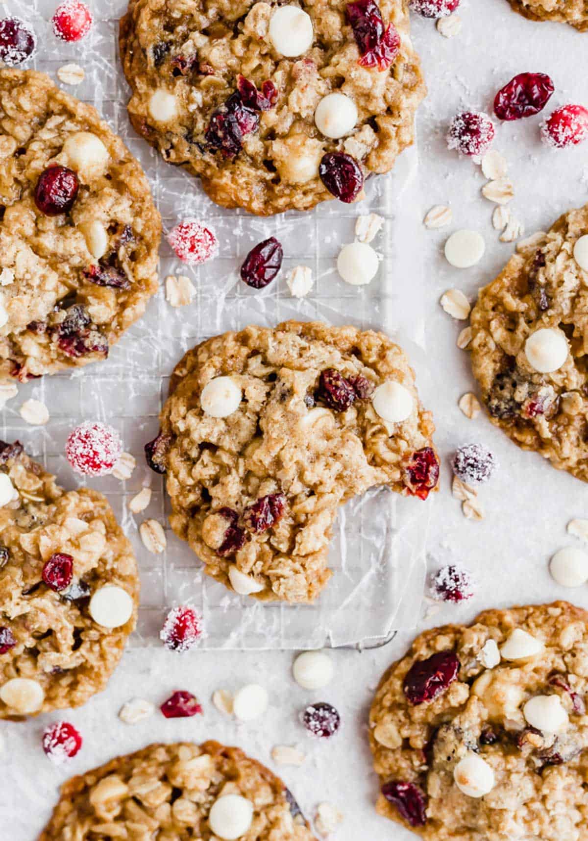 A bite taken out of a White Chocolate Cranberry Oatmeal Cookie.