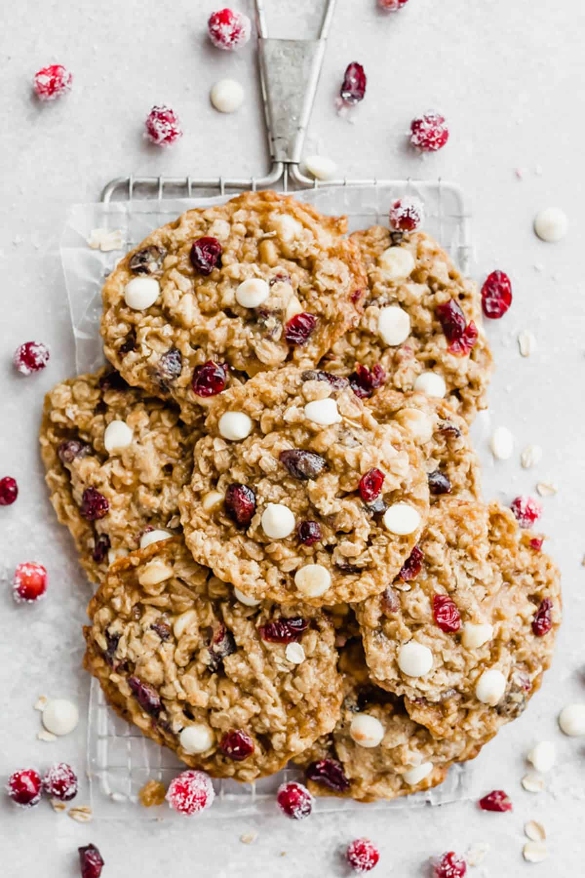 White Chocolate Cranberry Oatmeal Cookies in a stack on a wire rack.
