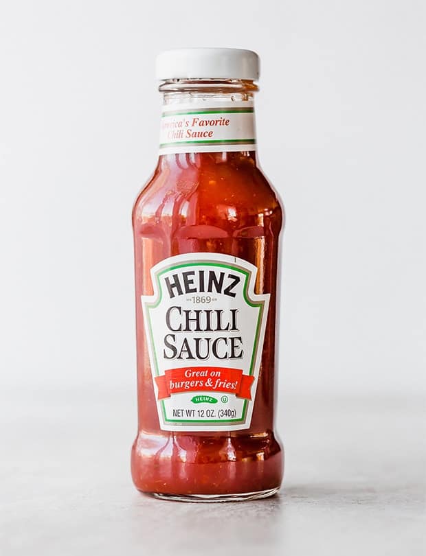A bottle of Heinz chili sauce, for making meatballs with grape jelly and chili sauce.