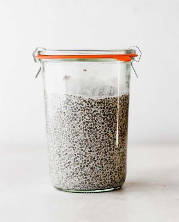 A large glass jar full of chia pudding.