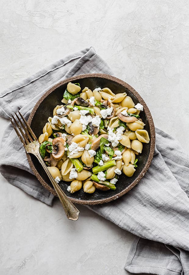 Goat cheese pasta with asparagus, mushrooms, and spinach.