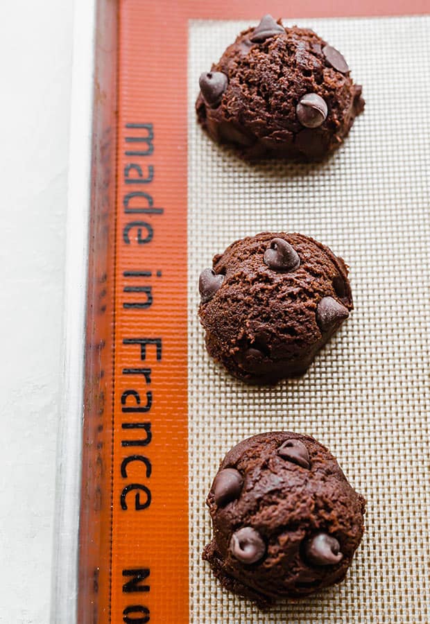 Brownie cookie dough batter on a baking sheet prior to baking.