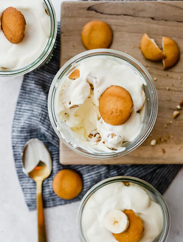 Magnolia Banana Pudding in a glass jar with a scoop of pudding taken out.