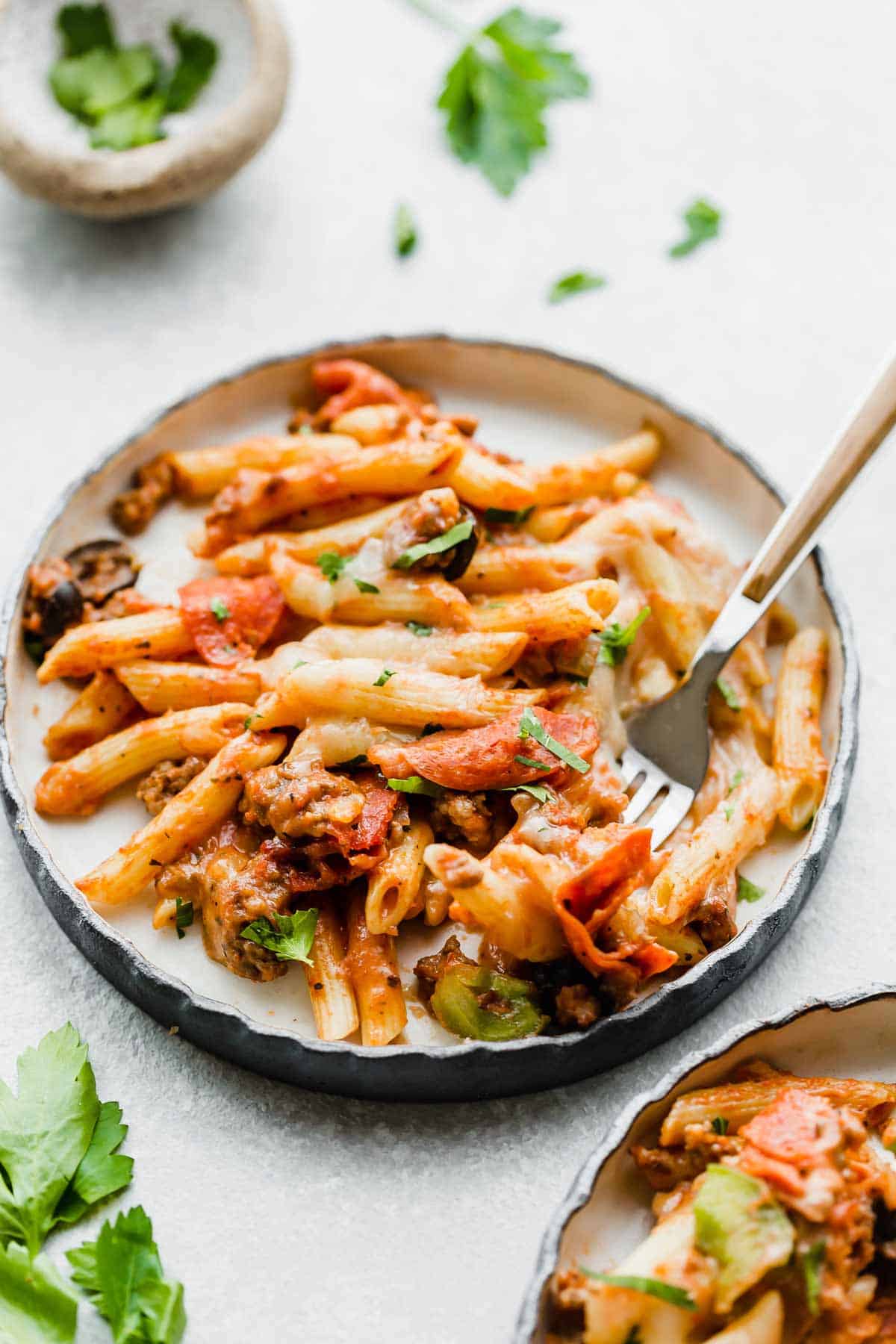 Deconstructed Pizza Casserole on a black plate.