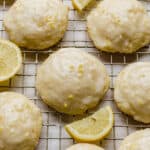 Glazed Lemon Ricotta Cookies on a wire cooling rack.