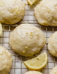Glazed Lemon Ricotta Cookies on a wire cooling rack.