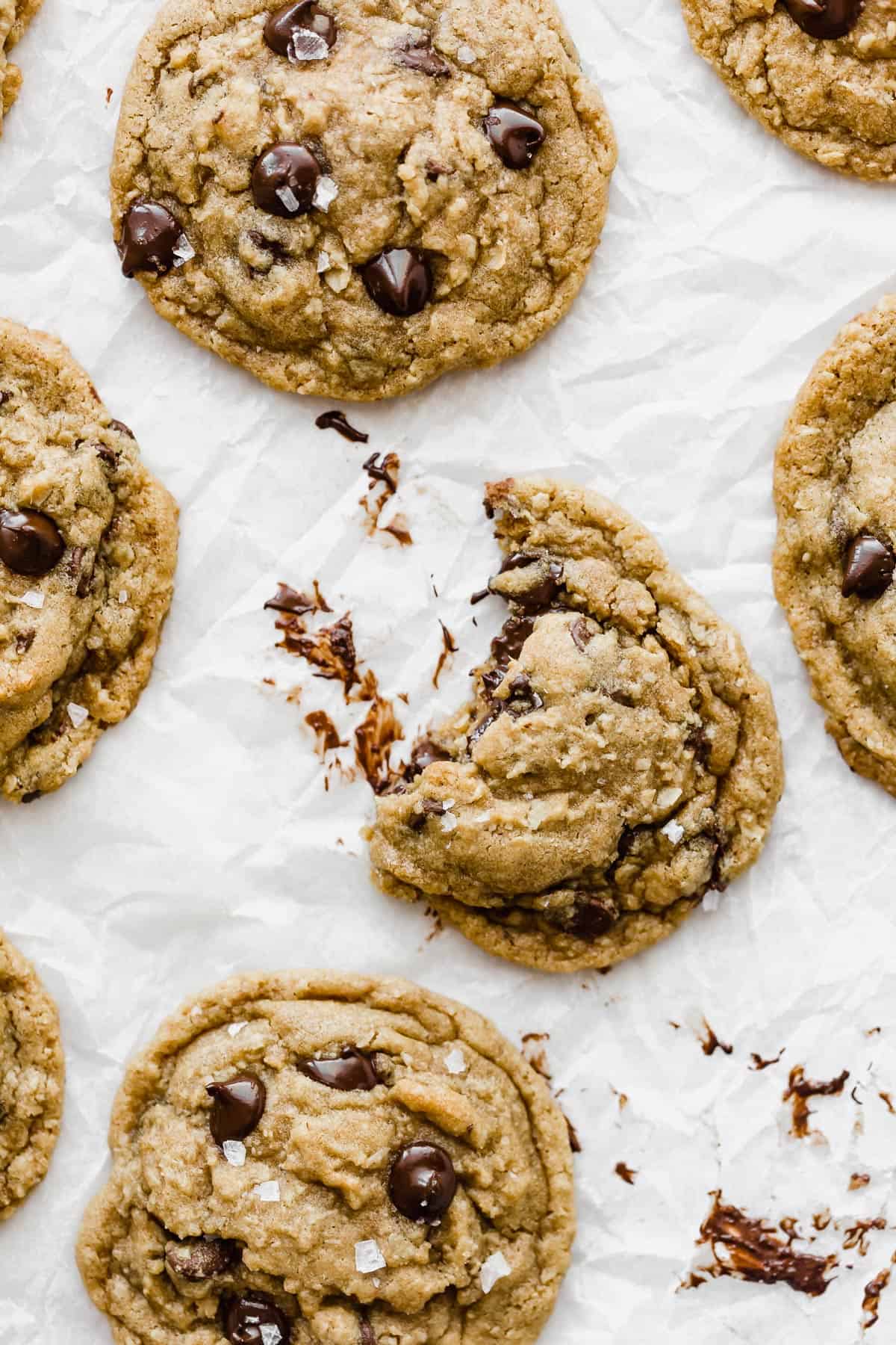 Brown Butter Chocolate Chip Cookie with a cookie that has a bite taken out of it.