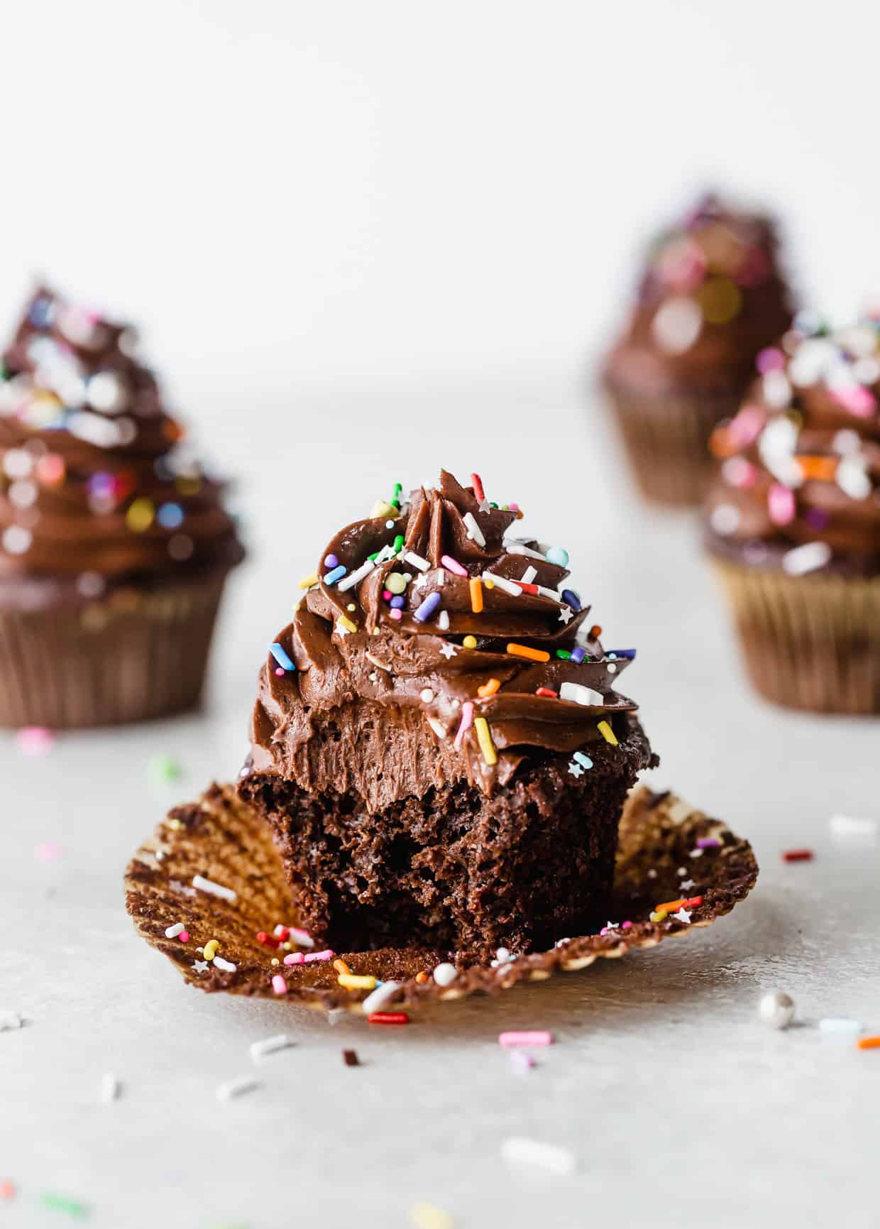 The best chocolate cupcake with a bite taken out of it.