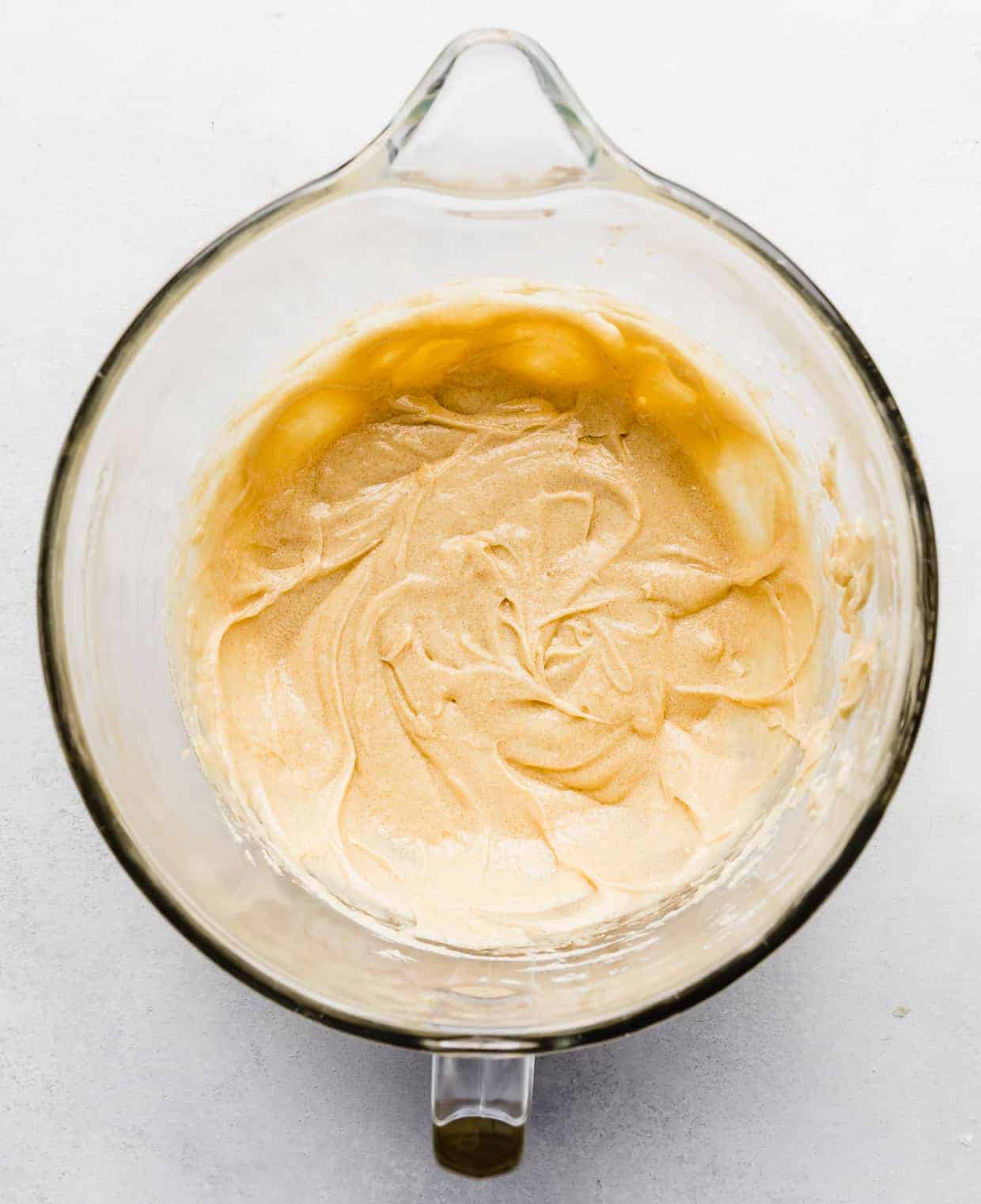 A light yellow soft creamed mixture in a glass bowl.