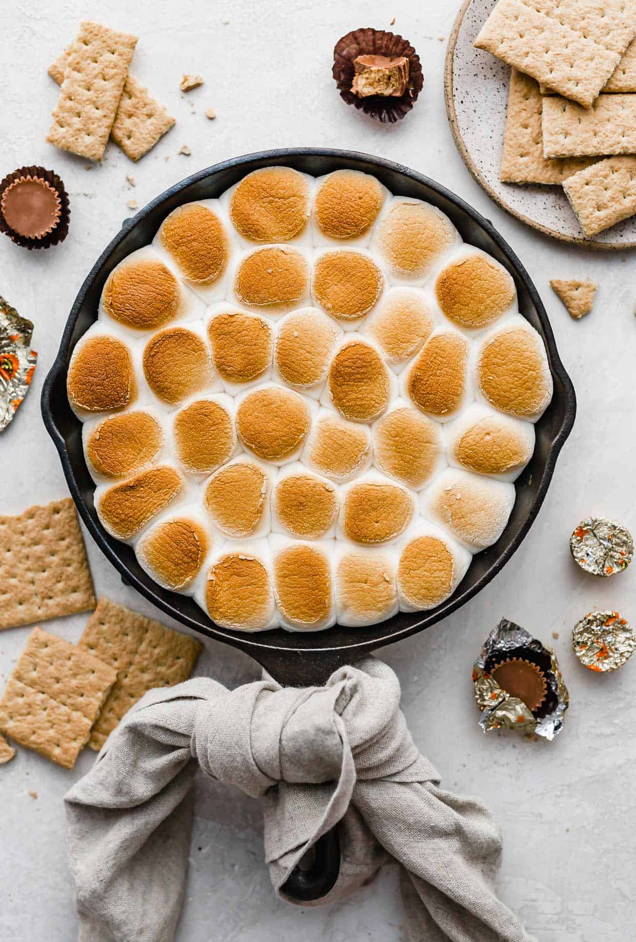 Reese's S'mores baked in a skillet on a light gray background.