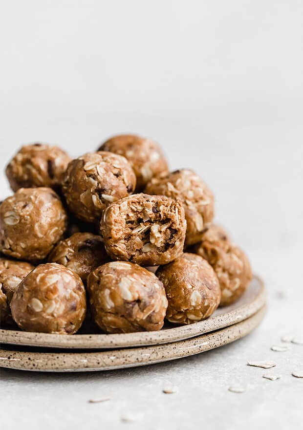 A plate full of Chocolate Peanut Butter Protein Balls.