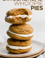 A stack of gingerbread whoopie pies.