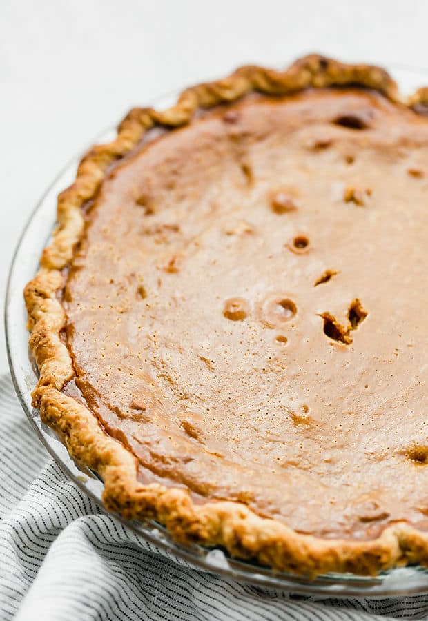 A fully cooked pumpkin pie.