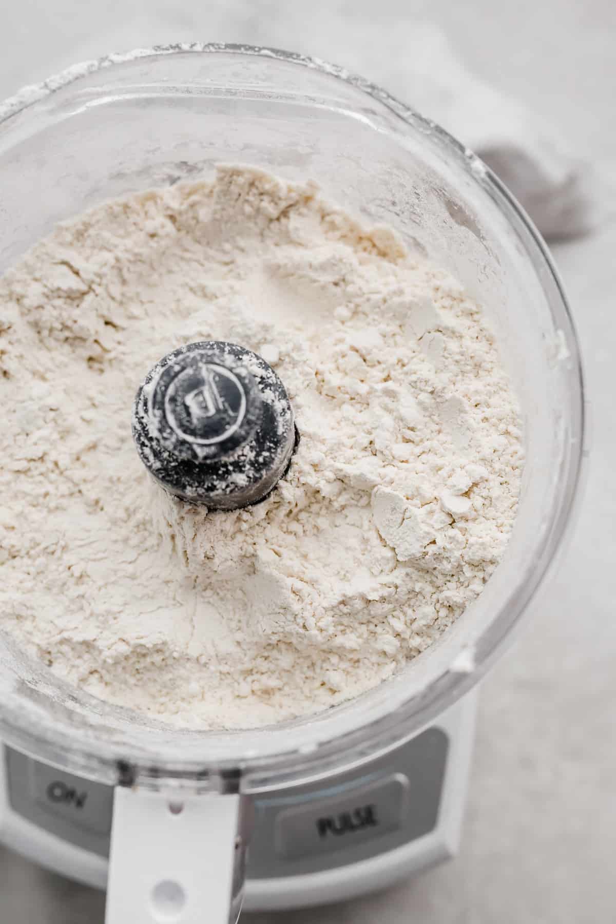 An all butter Food Processor Pie Crust ingredients in a food processor.