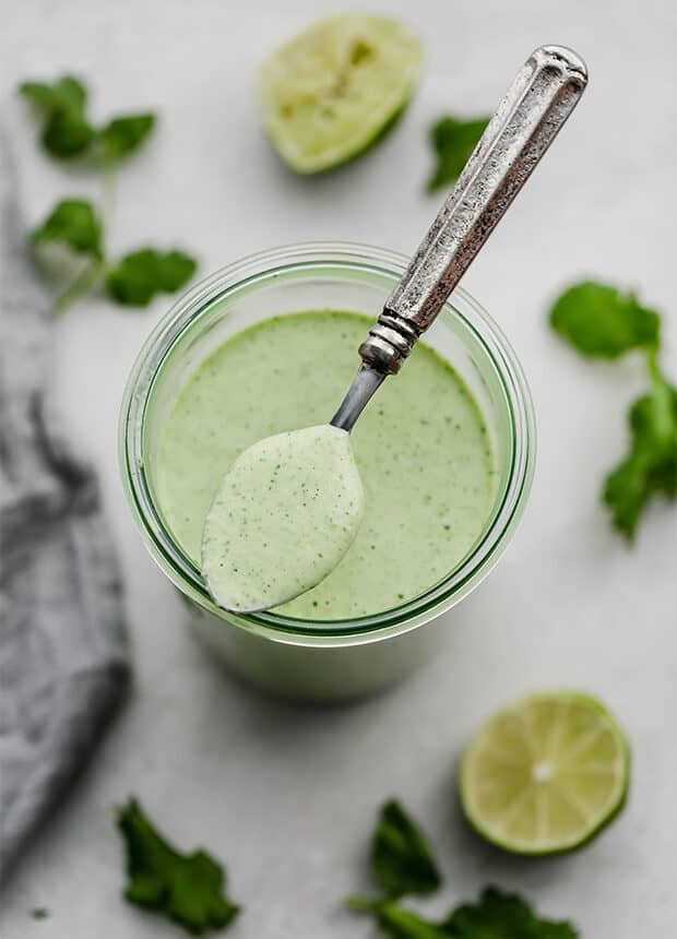 A jar of Cafe Rio's creamy cilantro lime dressing.