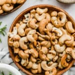 Rosemary roasted cashews on a plate.