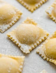 A close up photo of homemade ravioli.