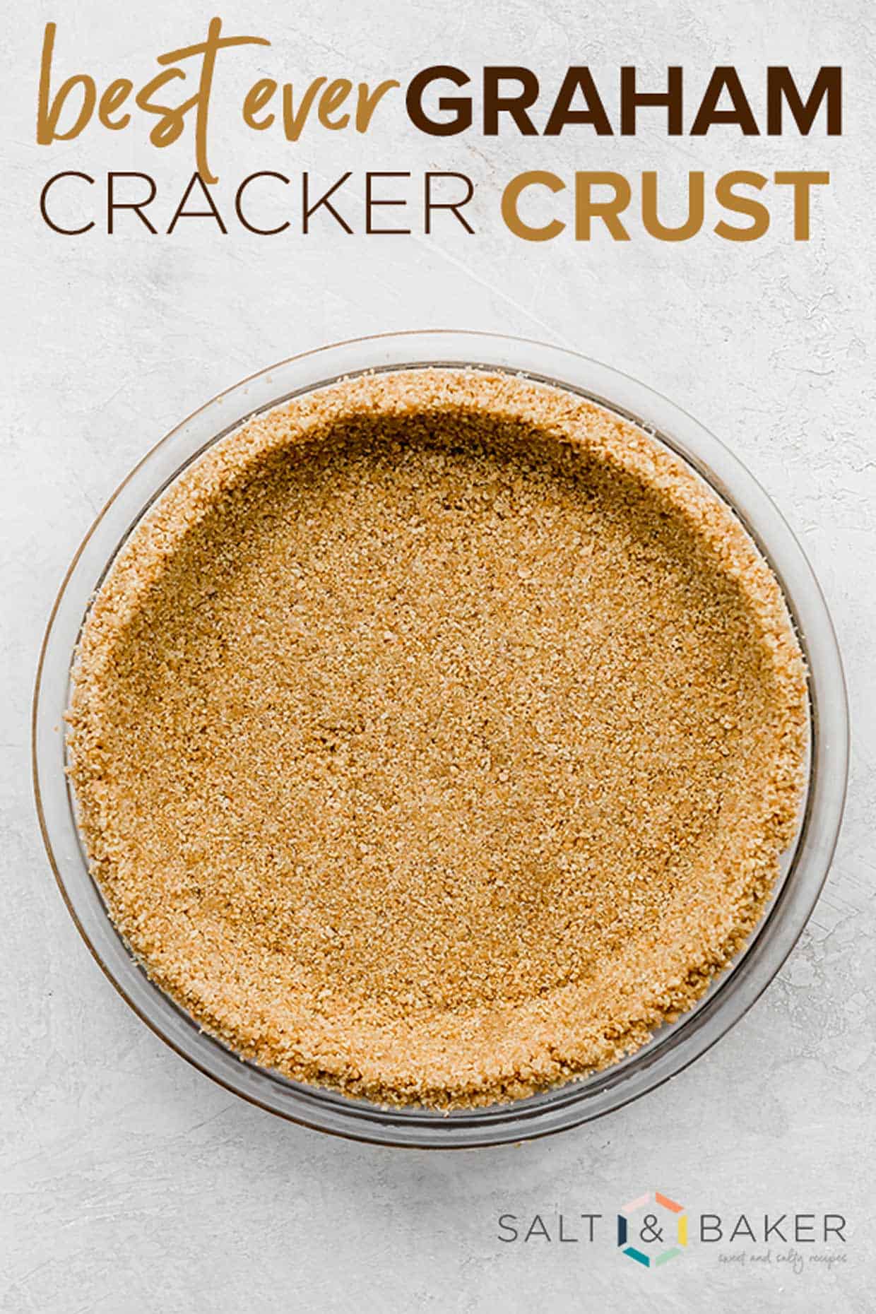 The best Graham Cracker Crust in a pie plate on a white background with the words, "best ever graham cracker crust" written in brown and tan font over the photo.