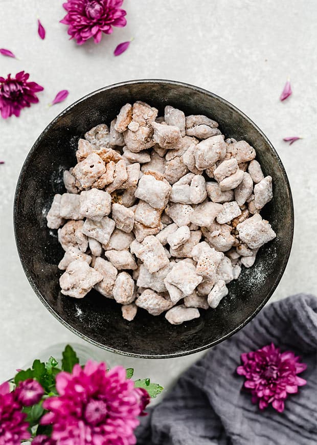 A large bowl of homemade small batch muddy buddies.