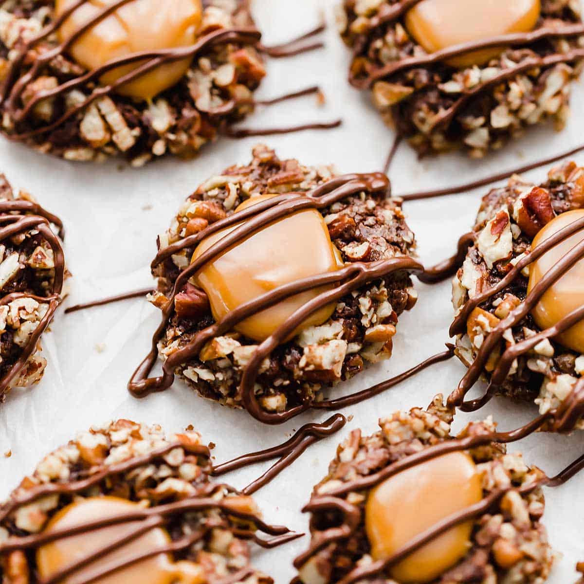 Turtle Cookies drizzled with melted chocolate.