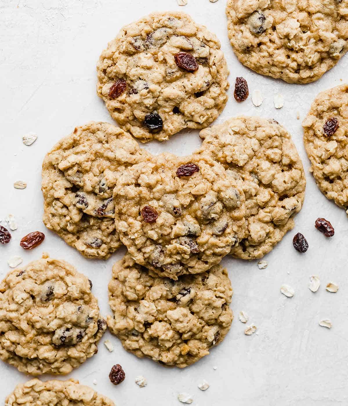 Soft Oatmeal Raisin Cookies on a white background.