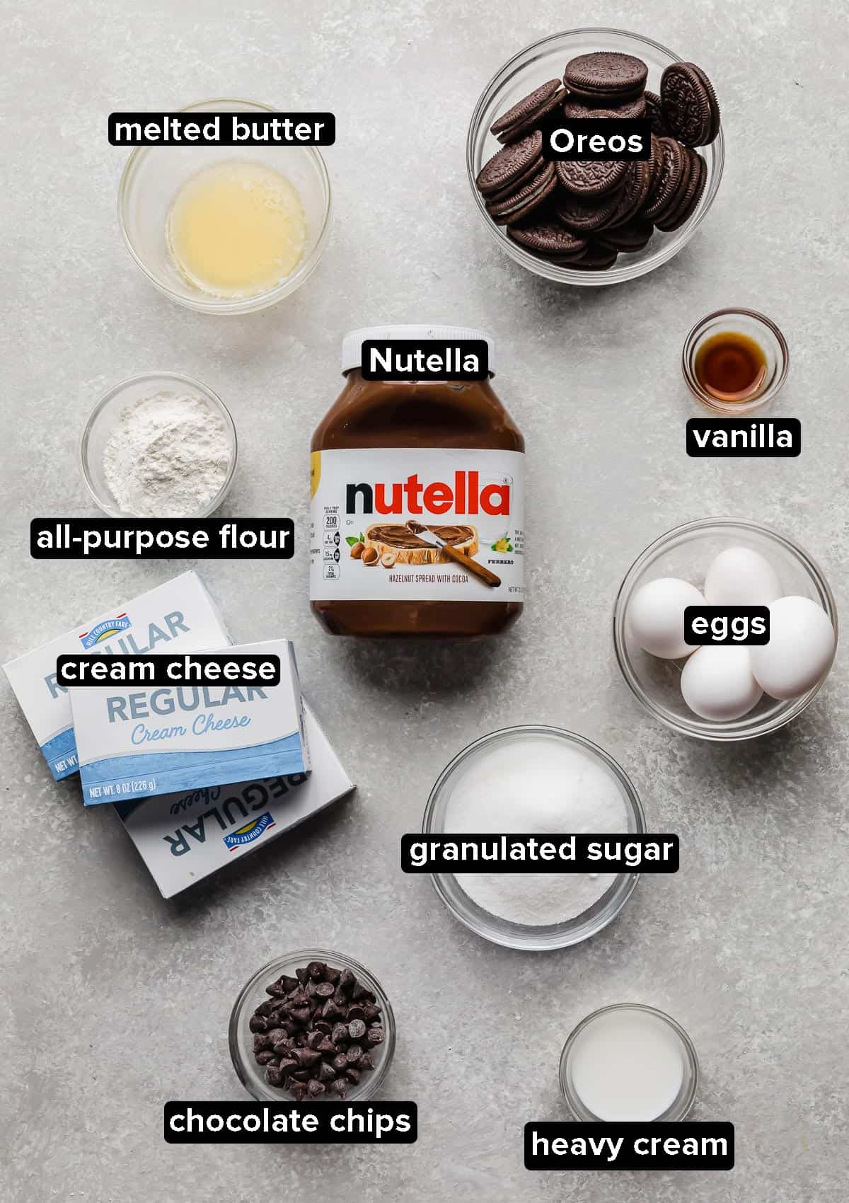 Nutella Cheesecake ingredients on a light gray background.
