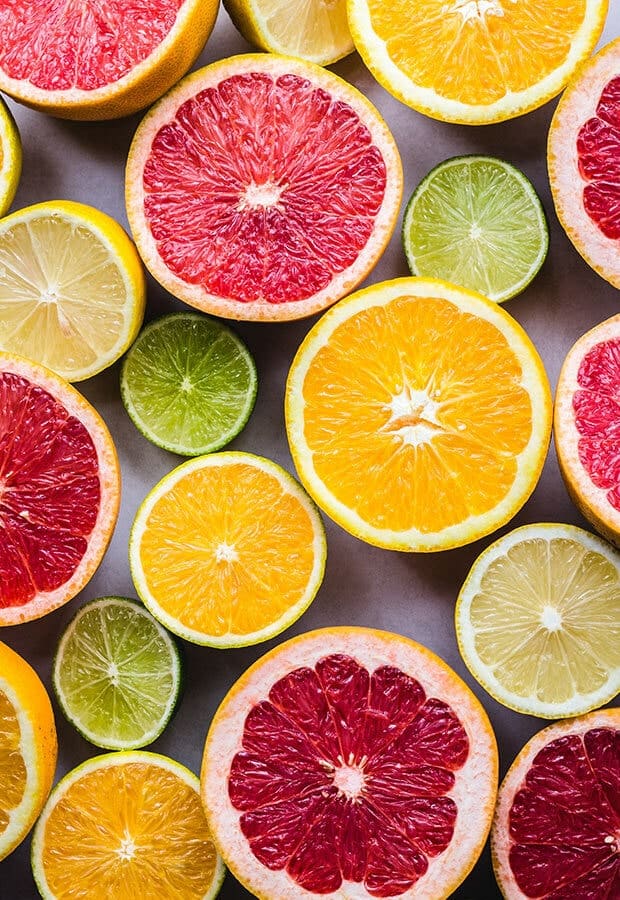 Colorful citrus, green, pink, orange, yellow.