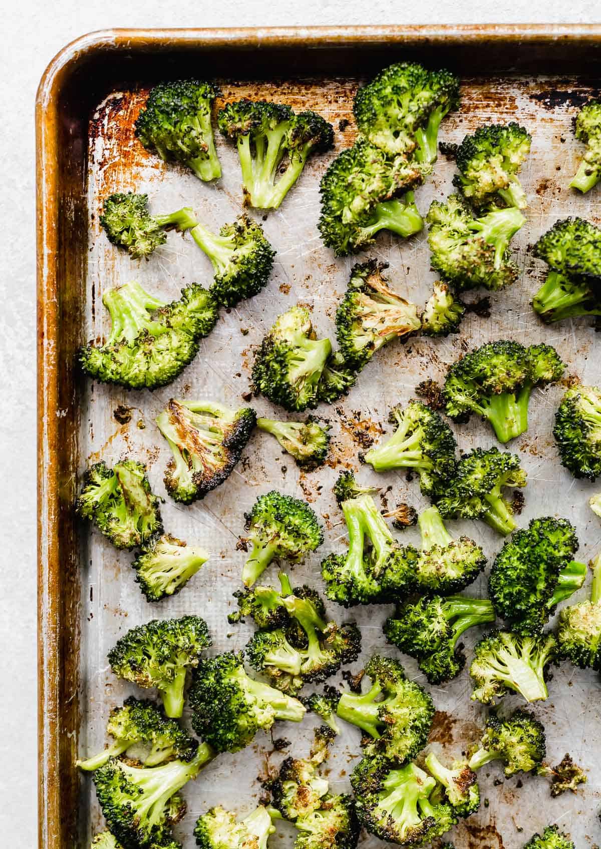 Easy Roasted Broccoli florets on a baking sheet.