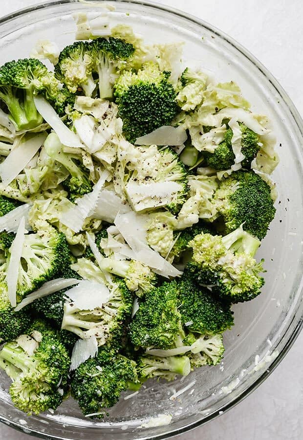 Broccoli florets and chopped cabbage in a bowl.