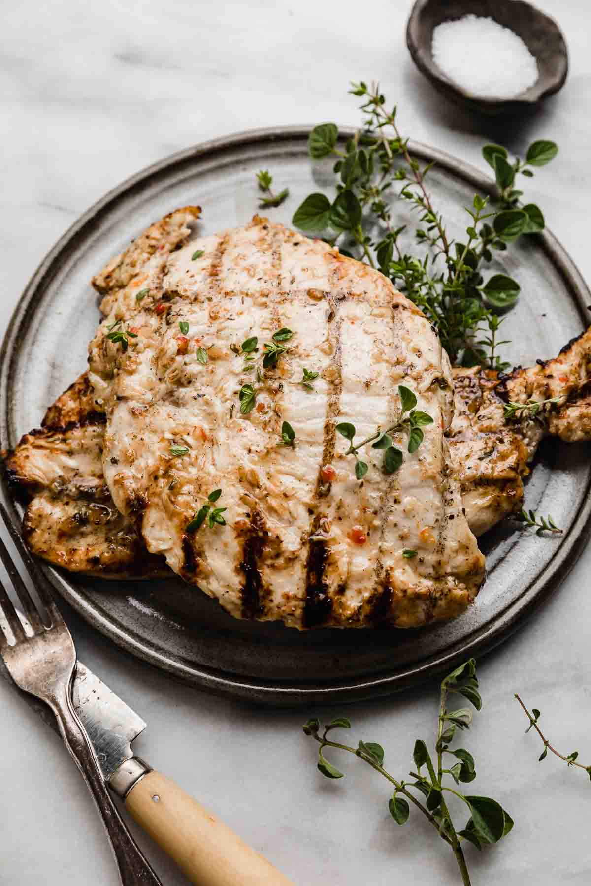 Italian Grilled Chicken on a gray plate.