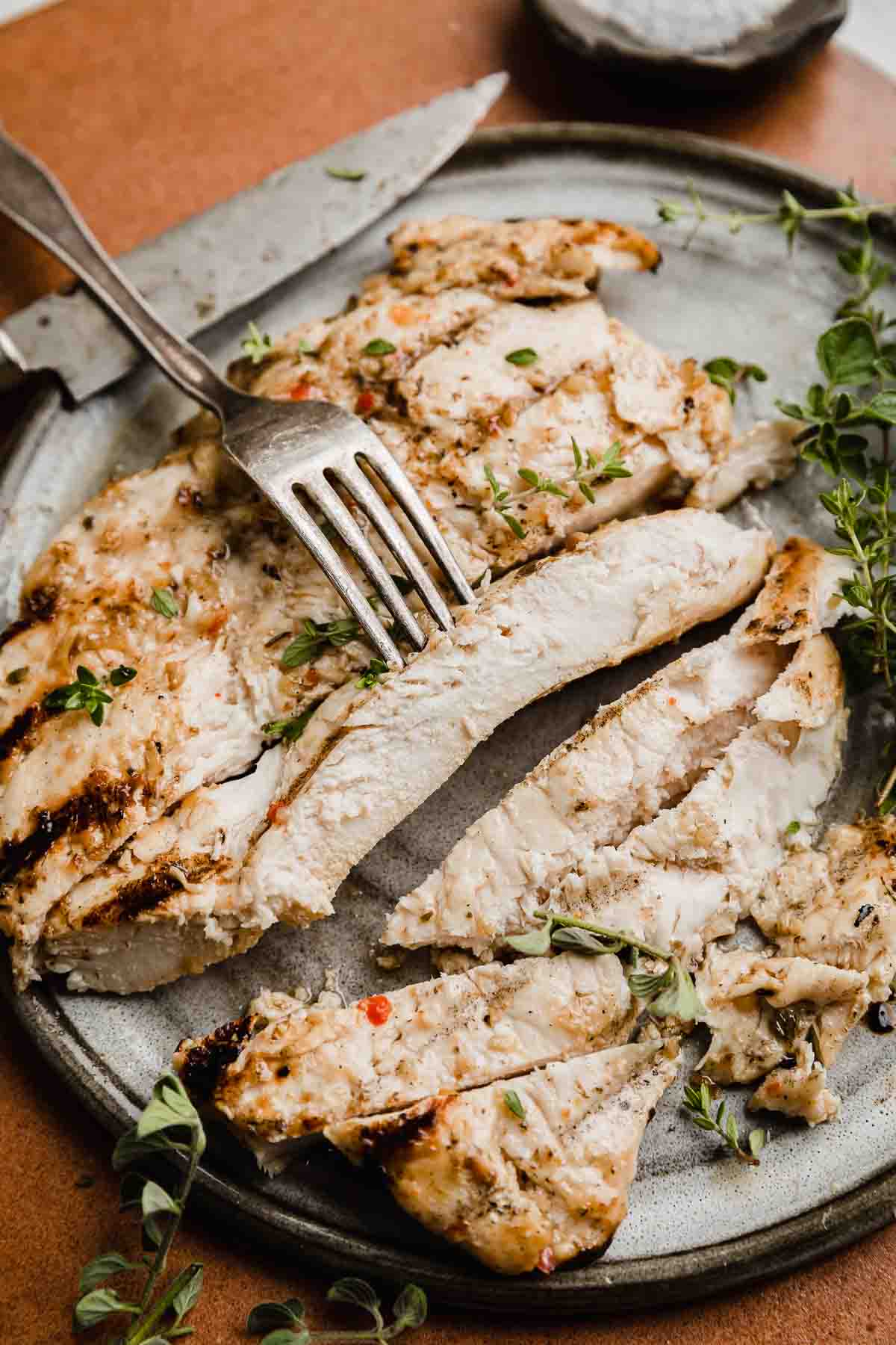 Grilled Italian chicken cut into strips.