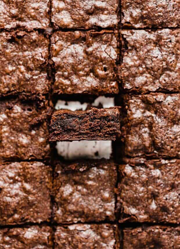Brownies cut into squares, lined up side by side.